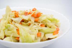 Fried Cabbage With Fish Sauce. it is a simple menu, make the fish sauce to be good smell on the surface of the pan. When sauce is heated, the water will evaporate, leaving only dried salt and fish. photo