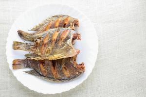 Deep Fried Tilapia Fish with Fish Sauce and Pepper photo