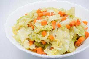 Fried Cabbage With Fish Sauce. it is a simple menu, make the fish sauce to be good smell on the surface of the pan. When sauce is heated, the water will evaporate, leaving only dried salt and fish. photo