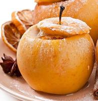 Baked apples with honey and nuts photo