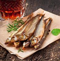 smoked fish with beer photo