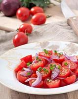 tomato cherry salad with  black pepper and onion photo
