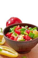 salad of sweet colorful peppers with olive oil photo