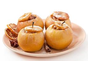 Baked apples with honey and nuts photo
