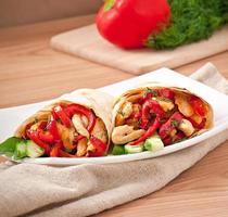 pita stuffed with chicken and peppers photo