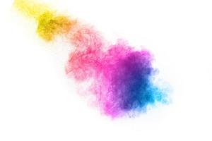 abstract multicolored powder splatted on white background,Freeze motion of color powder exploding photo
