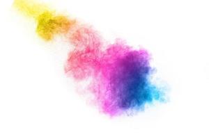 abstract multicolored powder splatted on white background,Freeze motion of color powder exploding photo