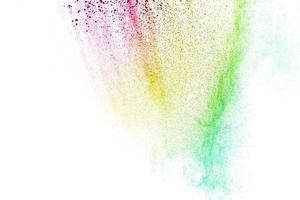 abstract multicolored powder splatted on white background,Freeze motion of color powder exploding photo