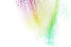 abstract multicolored powder splatted on white background,Freeze motion of color powder exploding photo