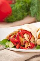 pita stuffed with chicken and peppers photo