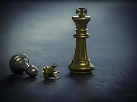 Silver chess pawn wear gold crown standing on a chessboard. Demonstrate leadership and business growth with teamwork to victory, business strategy concept for success. photo