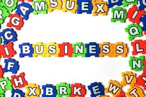 Puzzle business on white background photo