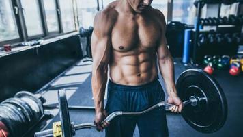 Muscle man lifting photo