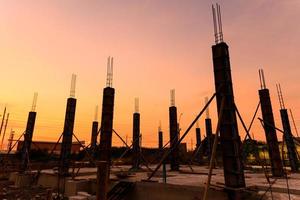 silhouette of a house column at construction site on  housing project photo