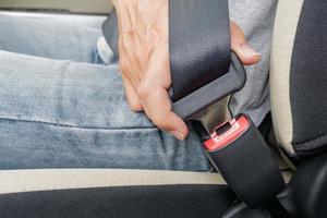 Fasten the car seat belt. Safety belt safety first photo