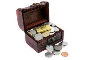 Old wooden chest with golden coins photo