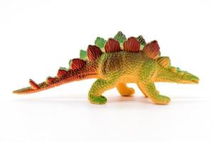 Stegosaurus toy model on white background photo