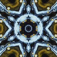 Dark circle abstract background. Kaleidoscope pattern in yellow and blue color. Free Photo