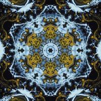 Dark circle abstract background. Kaleidoscope pattern in yellow and blue color. Free Photo