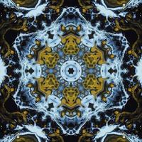 Dark circle abstract background. Kaleidoscope pattern in yellow and blue color. Free Photo