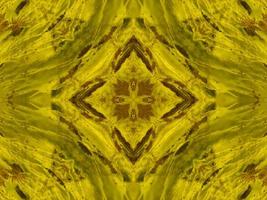 Reflection of colorful flowers in kaleidoscope pattern. Yellow and blue abstract background. Free photo. photo