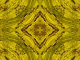 Reflection of colorful flowers in kaleidoscope pattern. Yellow and blue abstract background. Free photo. photo