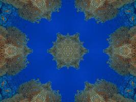 Colorful floral reflection kaleidoscope pattern. Abstract background. Free photo. photo