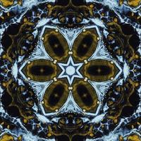 Dark circle abstract background. Kaleidoscope pattern in yellow and blue color. Free Photo