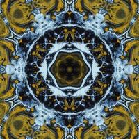Dark circle abstract background. Kaleidoscope pattern in yellow and blue color. Free Photo