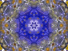 Reflection of colorful flowers in kaleidoscope pattern. Yellow and blue abstract background. Free photo. photo