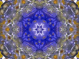 Reflection of colorful flowers in kaleidoscope pattern. Yellow and blue abstract background. Free photo. photo