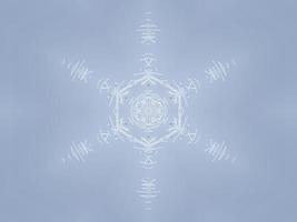 White snow kaleidoscope pattern. Abstract background with winter theme. Free photo. photo