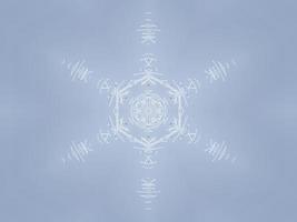 White snow kaleidoscope pattern. Abstract background with winter theme. Free photo. photo