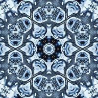 Dark reflection abstract background. Kaleidoscope pattern in black and blue color. Free photo. photo