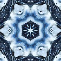 Dark reflection abstract background. Kaleidoscope pattern in black and blue color. Free photo. photo