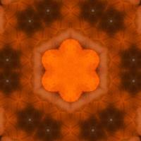 Orange abstract square background. Kaleidoscope pattern of desert. Free background. photo