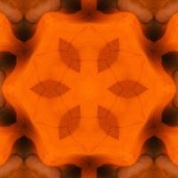Orange abstract square background. Kaleidoscope pattern of desert. Free background. photo