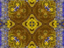 Reflection of colorful flowers in kaleidoscope pattern. Yellow and blue abstract background. Free photo. photo