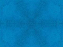 Plain blue kaleidoscope pattern. Abstract background. Free photo. photo