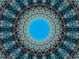 Colorful floral reflection kaleidoscope pattern. Abstract background. Free photo. photo