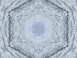 White snow kaleidoscope pattern. Abstract background with winter theme. Free photo. photo