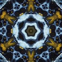 Dark circle abstract background. Kaleidoscope pattern in yellow and blue color. Free Photo