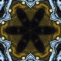 Dark circle abstract background. Kaleidoscope pattern in yellow and blue color. Free Photo