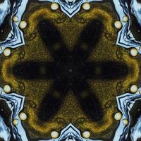 Dark circle abstract background. Kaleidoscope pattern in yellow and blue color. Free Photo