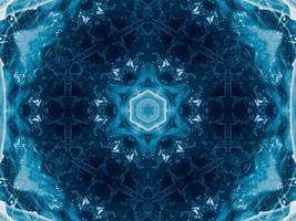 Reflection of deep blue sea in kaleidoscope pattern. Dark blue abstract background. Free photo. photo