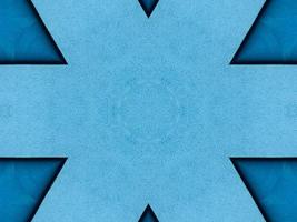 Plain blue kaleidoscope pattern. Abstract background. Free photo. photo