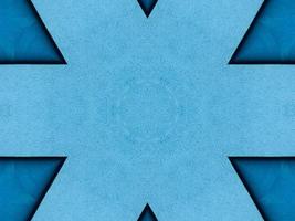 Plain blue kaleidoscope pattern. Abstract background. Free photo. photo