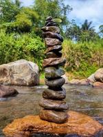 I arranged this stone in the river, my grandmother's village, Bogor, Indonesia photo