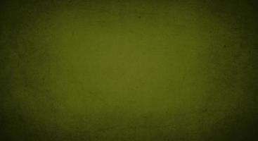 green army grunge background with soft lightand dark border, old vintage background photo