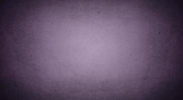 dark purple grunge background with soft lightand dark border, old vintage background photo